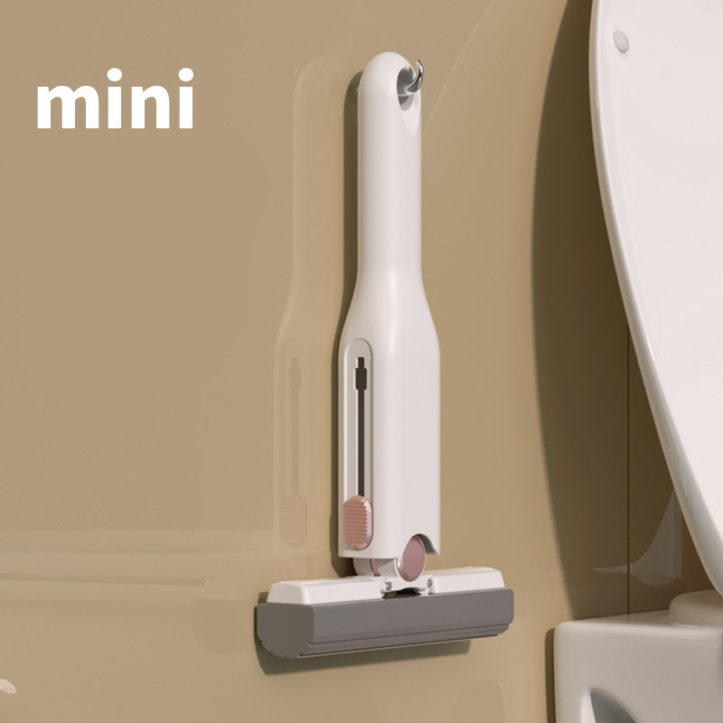 White mini portable cleaning mop with text on a beige background